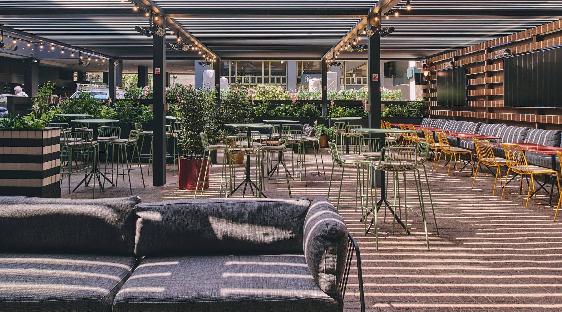 The London pub with outdoor seating and greenery, a must-visit for things to do near Euston Station.