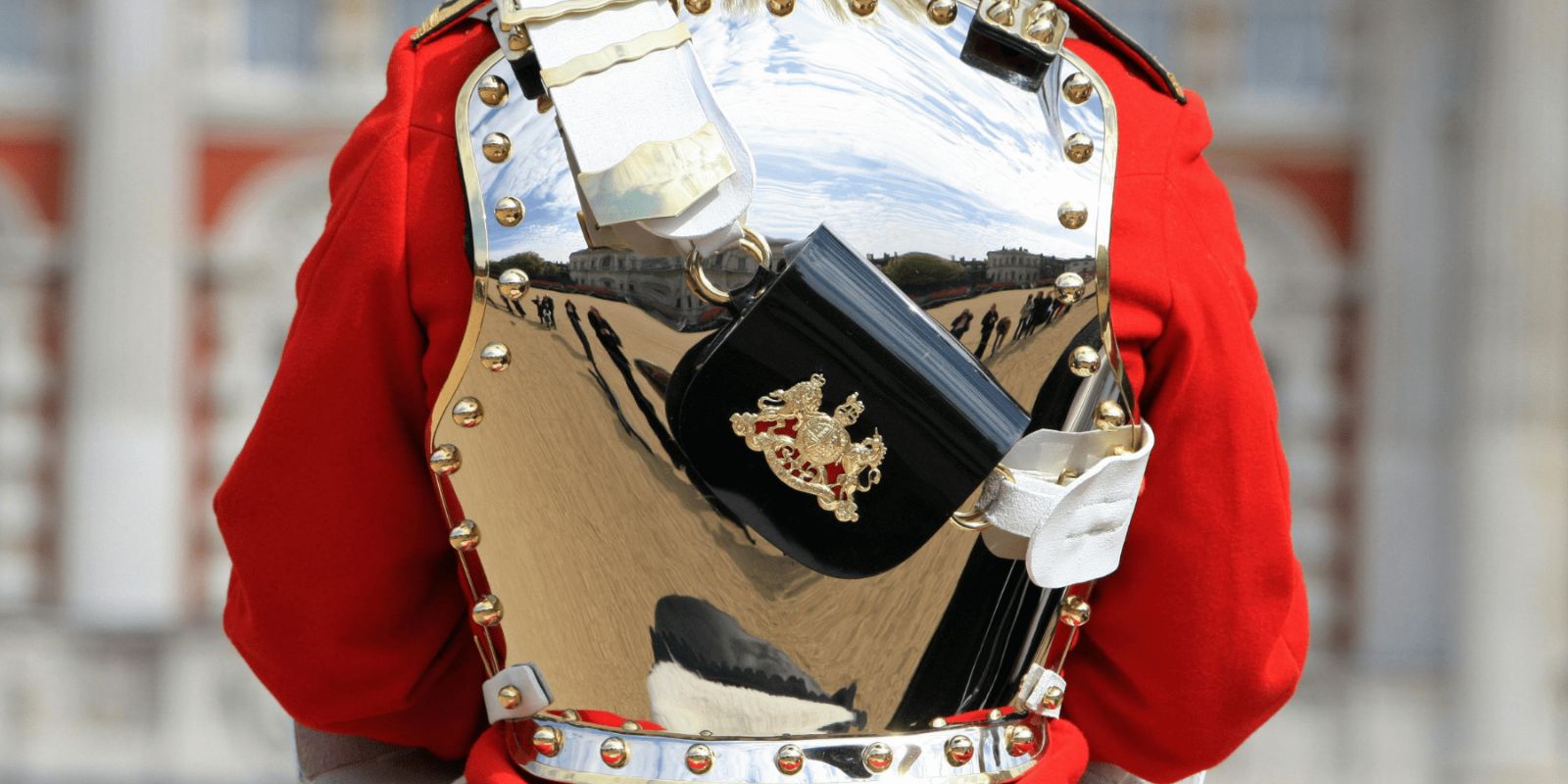 Close-up of Household Cavalry trooper’s polished breastplate reflecting Horse Guards Parade during Guard Mounting in London