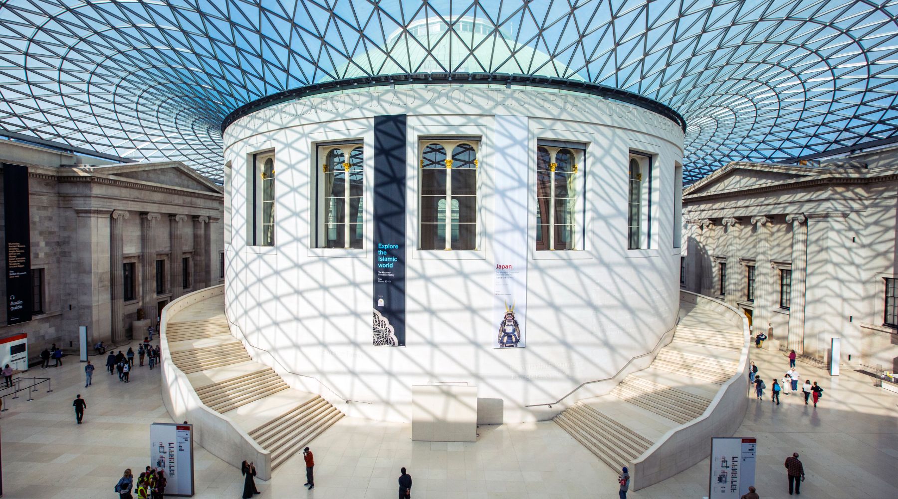 The Great Court at the British Museum, featuring its iconic glass roof and central Reading Room in central London. 